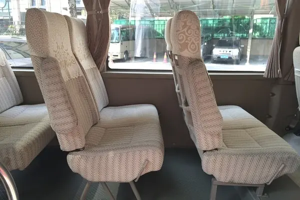 Toyota Coaster central aisle and passenger cabin